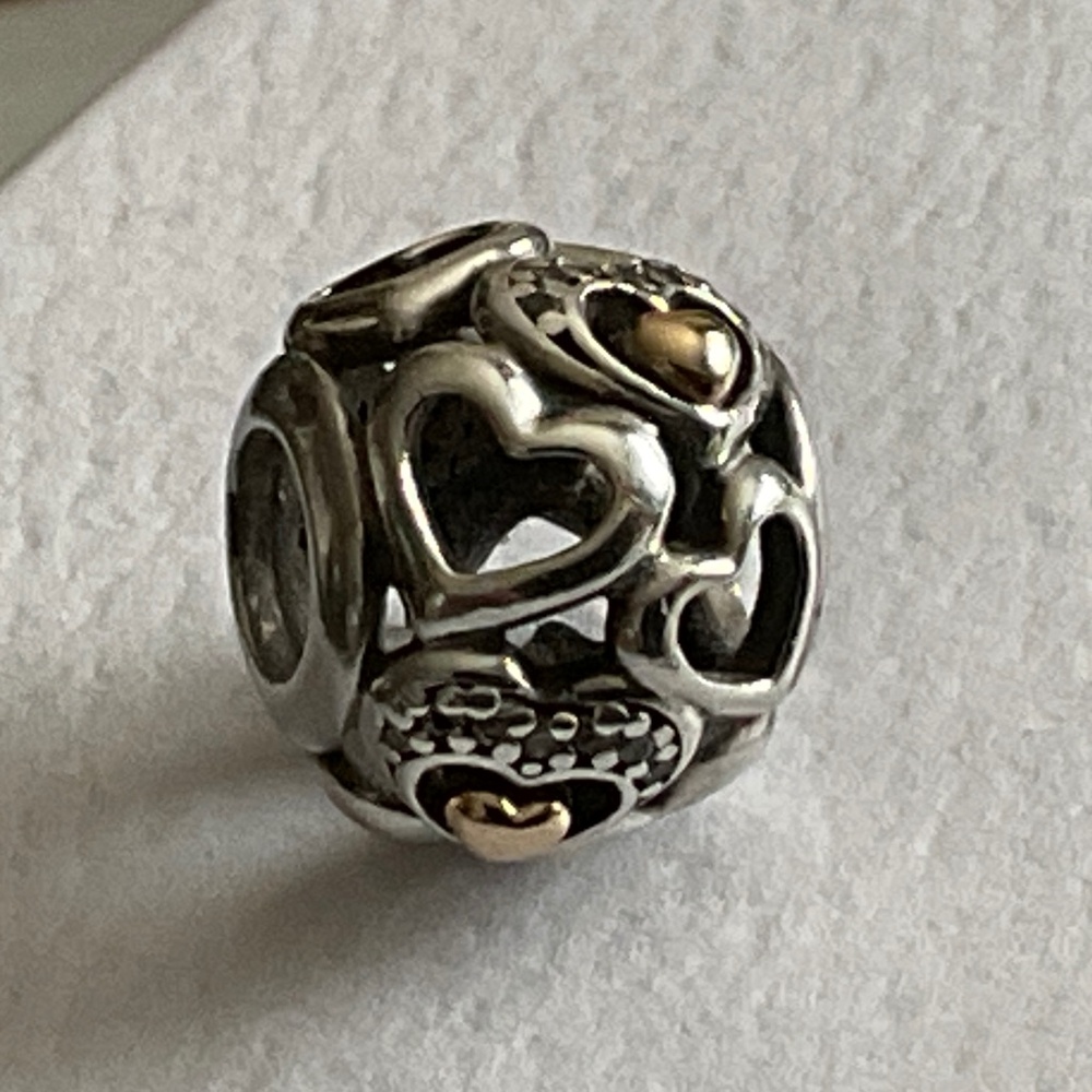 Pandora two tone charm with 14k gold hearts
